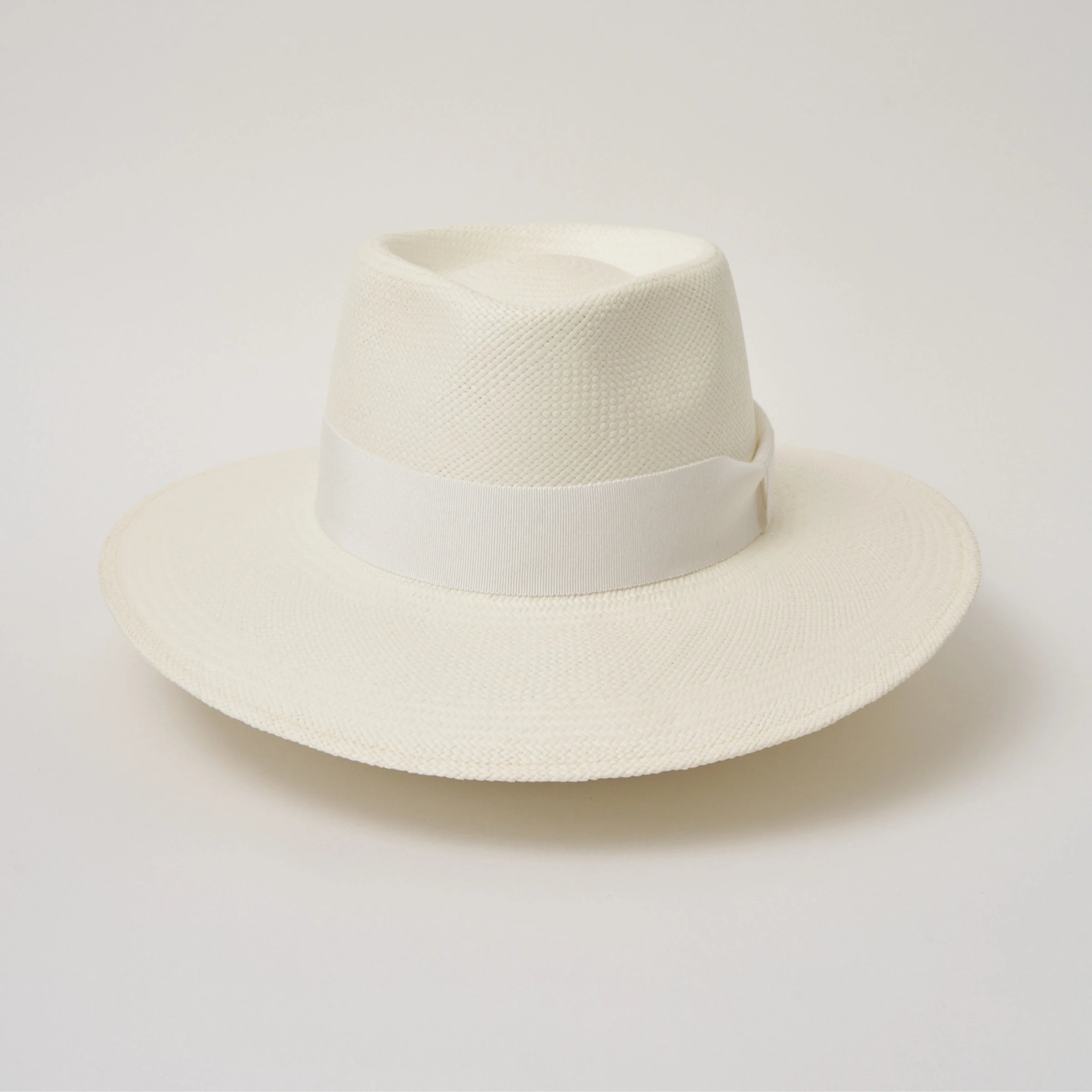 Studio image of the Camilo Country Cream coloured Panama Hat with White trim taken from the front showing pinch and brim.