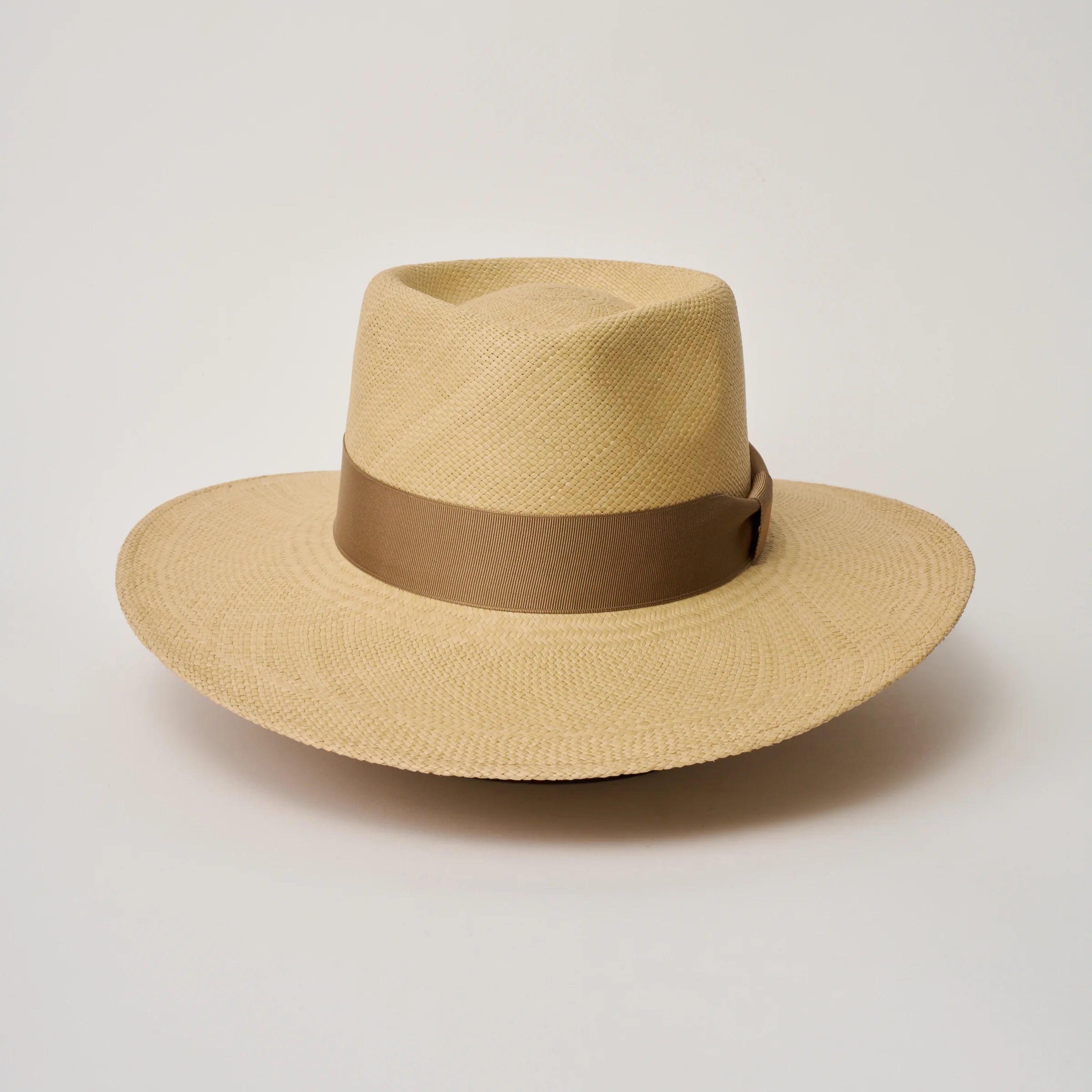 Studio image of the Camilo Country Sand coloured Panama Hat with Tan trim taken from the front, showing pinch.