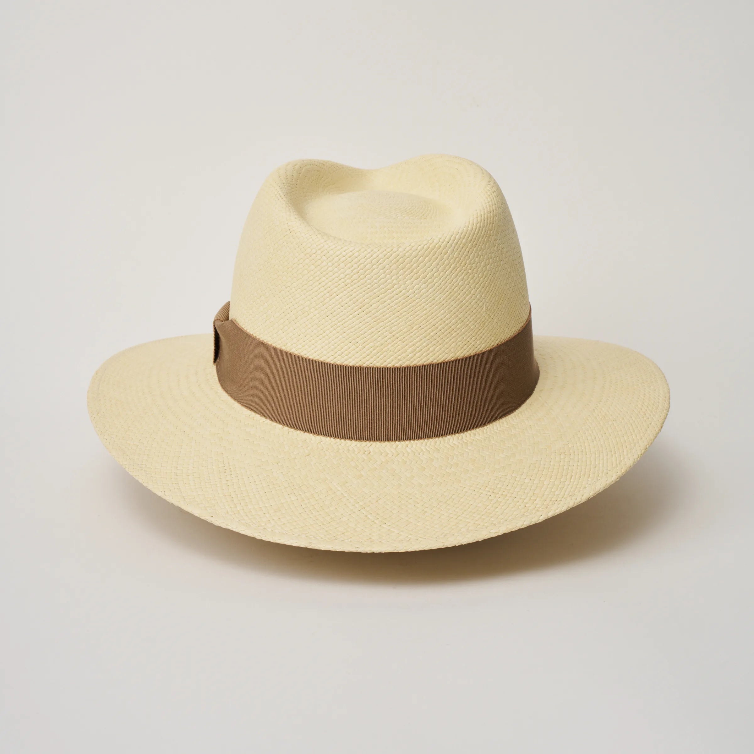 Studio image of the Camilo Executive Natural coloured Panama Hat with Oat trim taken from the back.