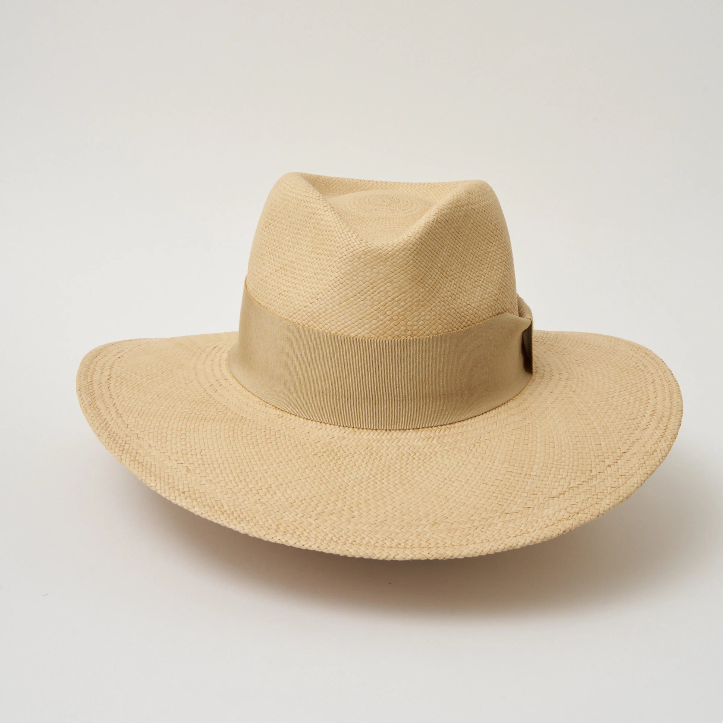 Studio image of the Camilo Oro Sand coloured Panama Hat with Camel trim taken from the front showing pinch and brim.