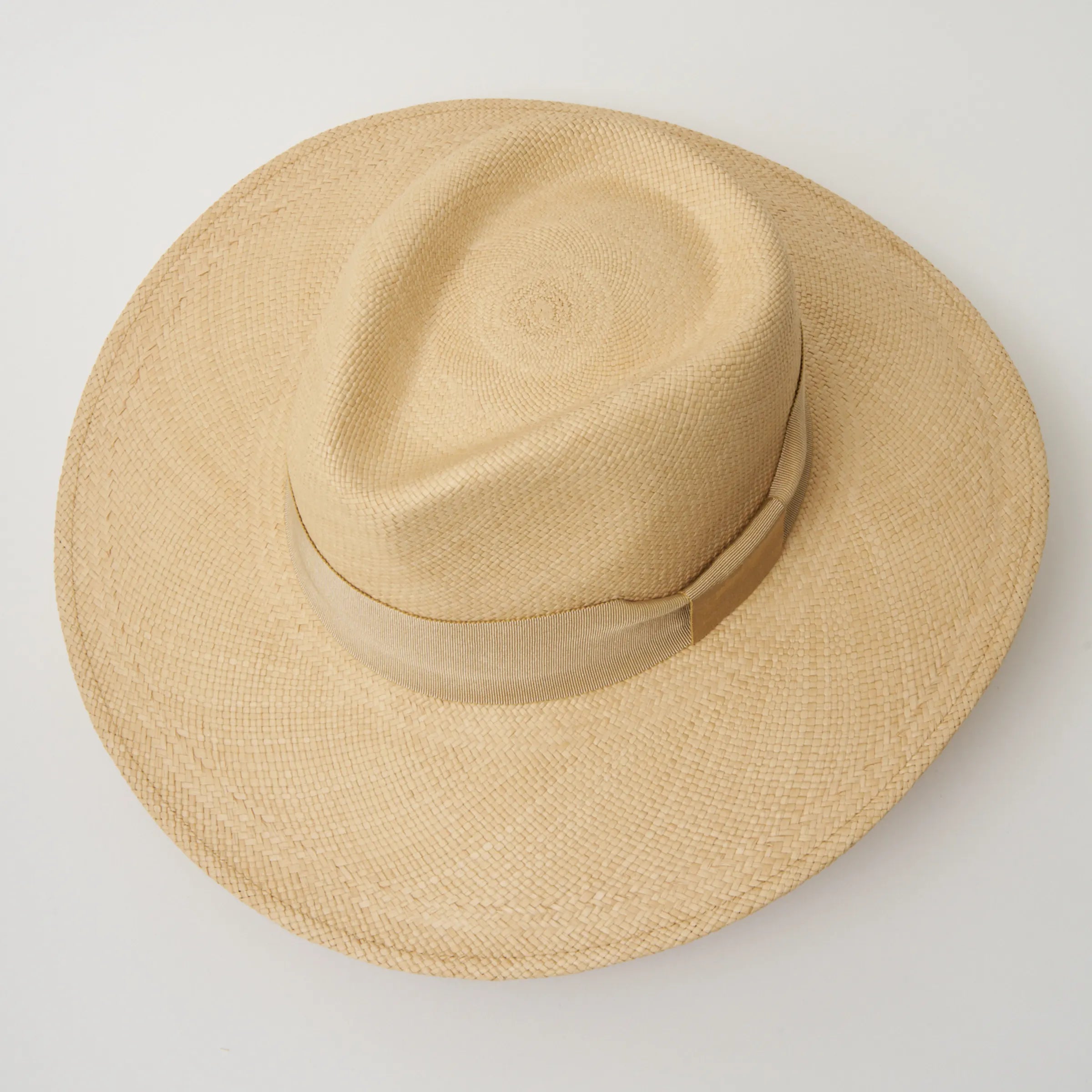 Studio image, taken looking down at the Camilo Oro Sand coloured Panama Hat with Camel trim, showing the crown shape and pinch.