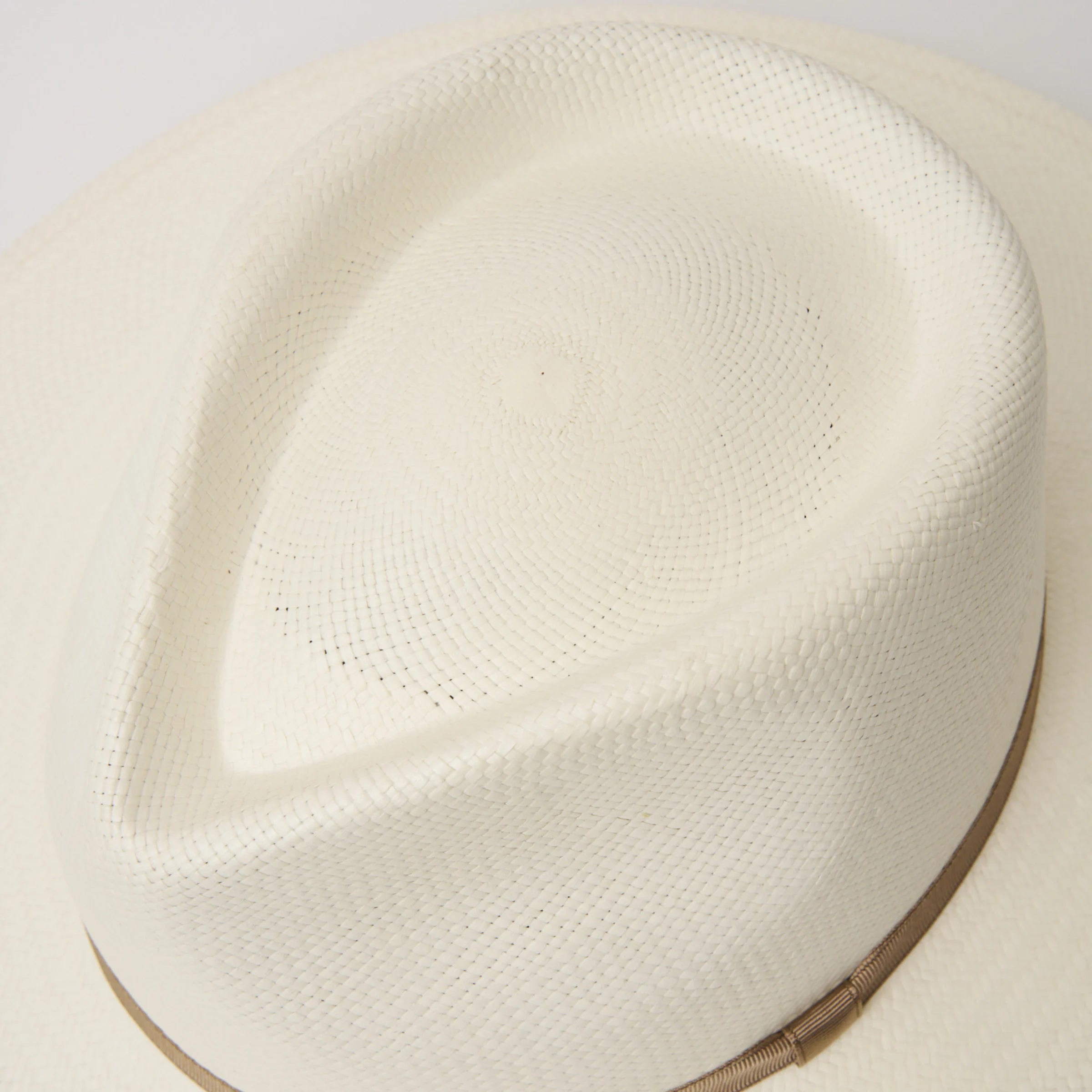 Studio closeup image of the weave on the Cream/Taupe coloured Camilo Vita Panama hat.