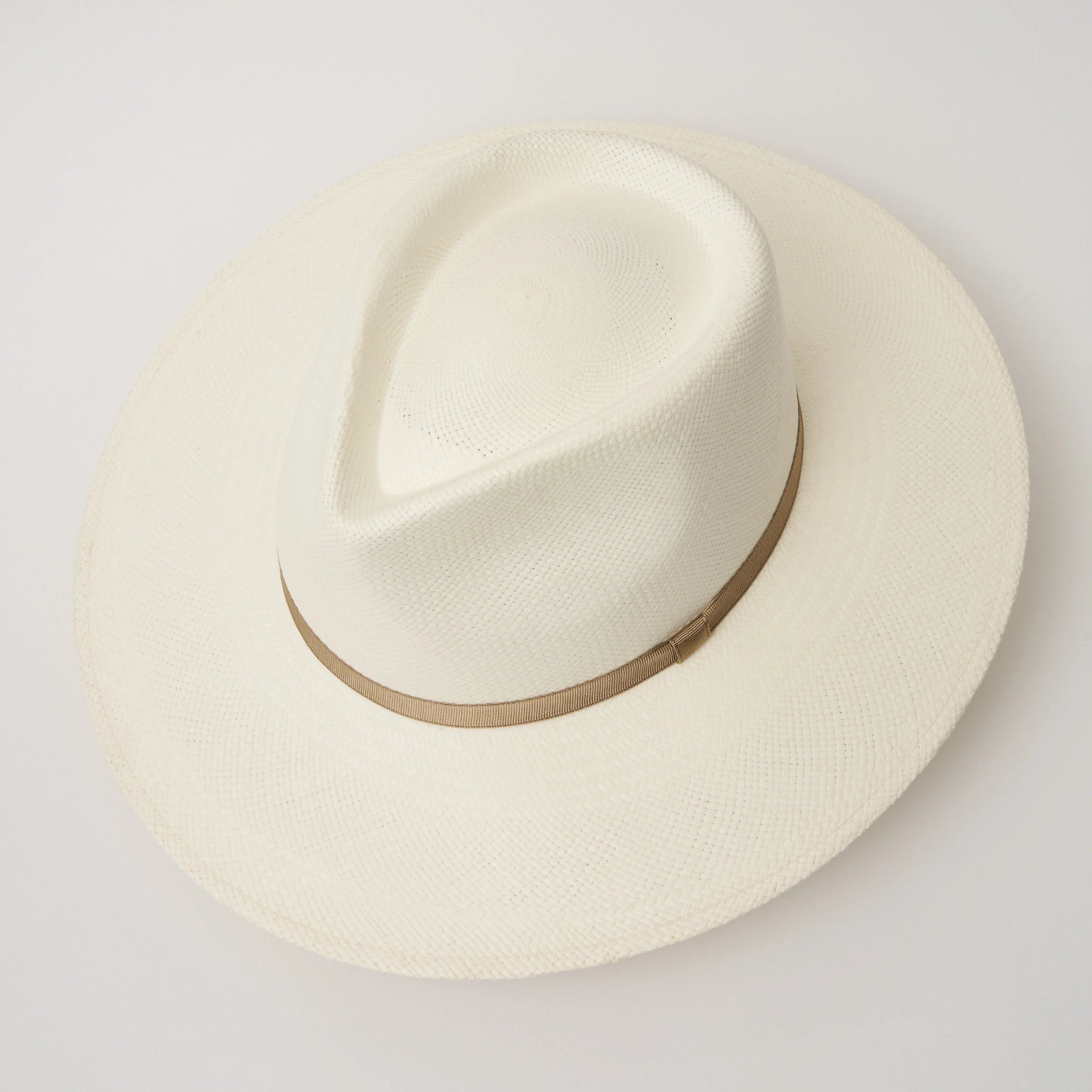 Studio image, taken looking down at the Camilo Vita Cream coloured Panama Hat with Taupe trim, showing the crown shape and pinch.