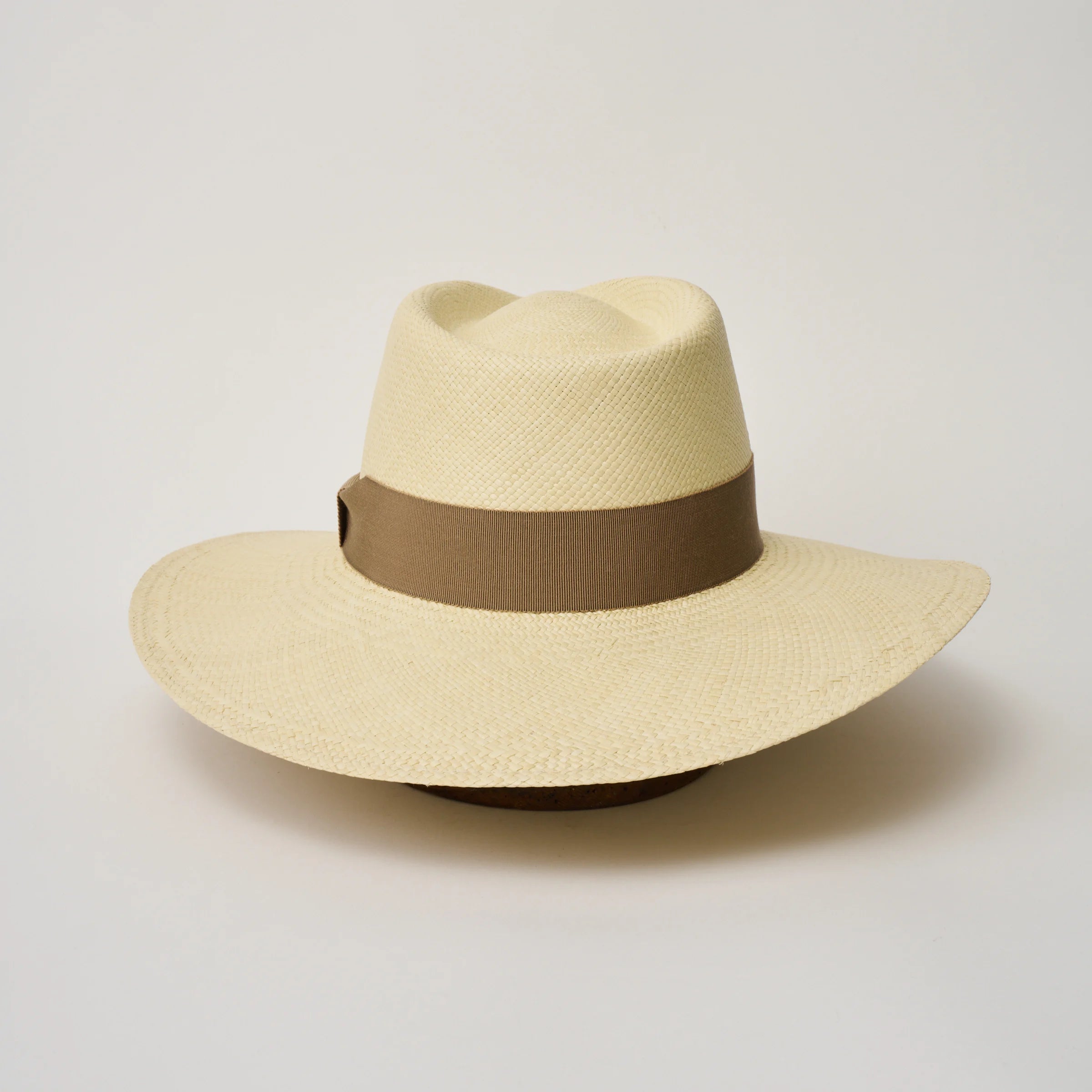 Studio image of the Camilo Vita Natural coloured Panama Hat with Oat trim shown from the back.