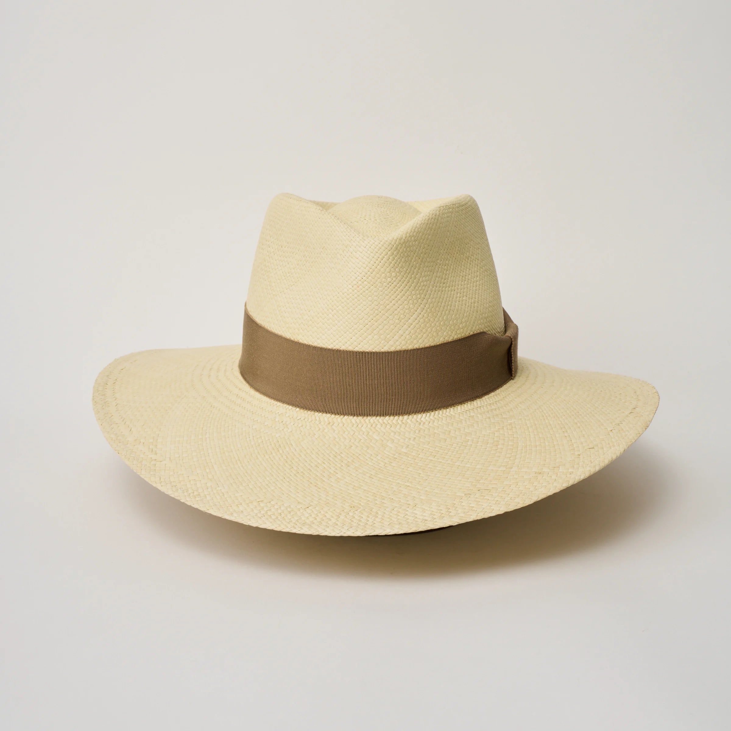 Studio image of the Camilo Vita Natural coloured Panama Hat with Oat trim taken from the front showing pinch and brim.
