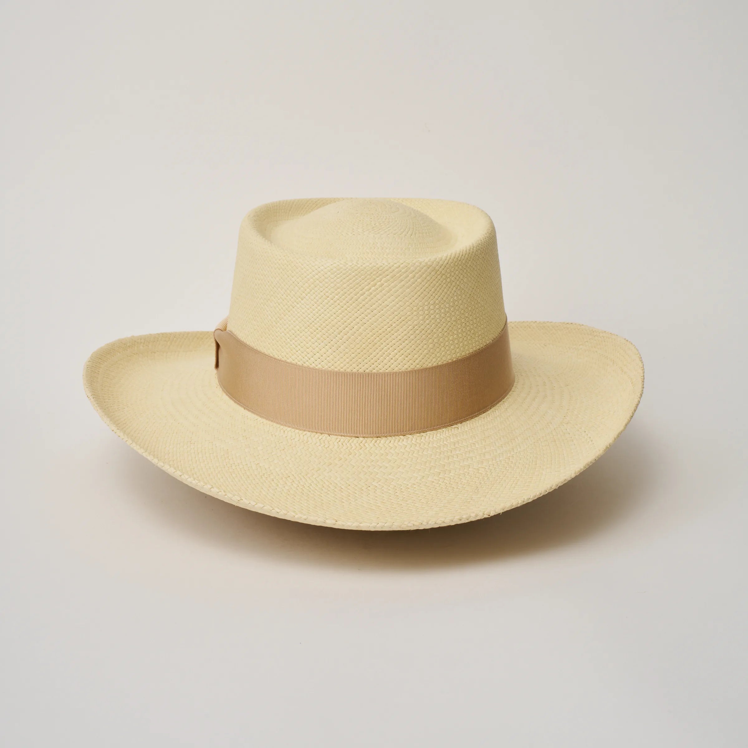Studio image of the Camilo Gambler Natural coloured Panama Hat with Bone trim taken from the back.