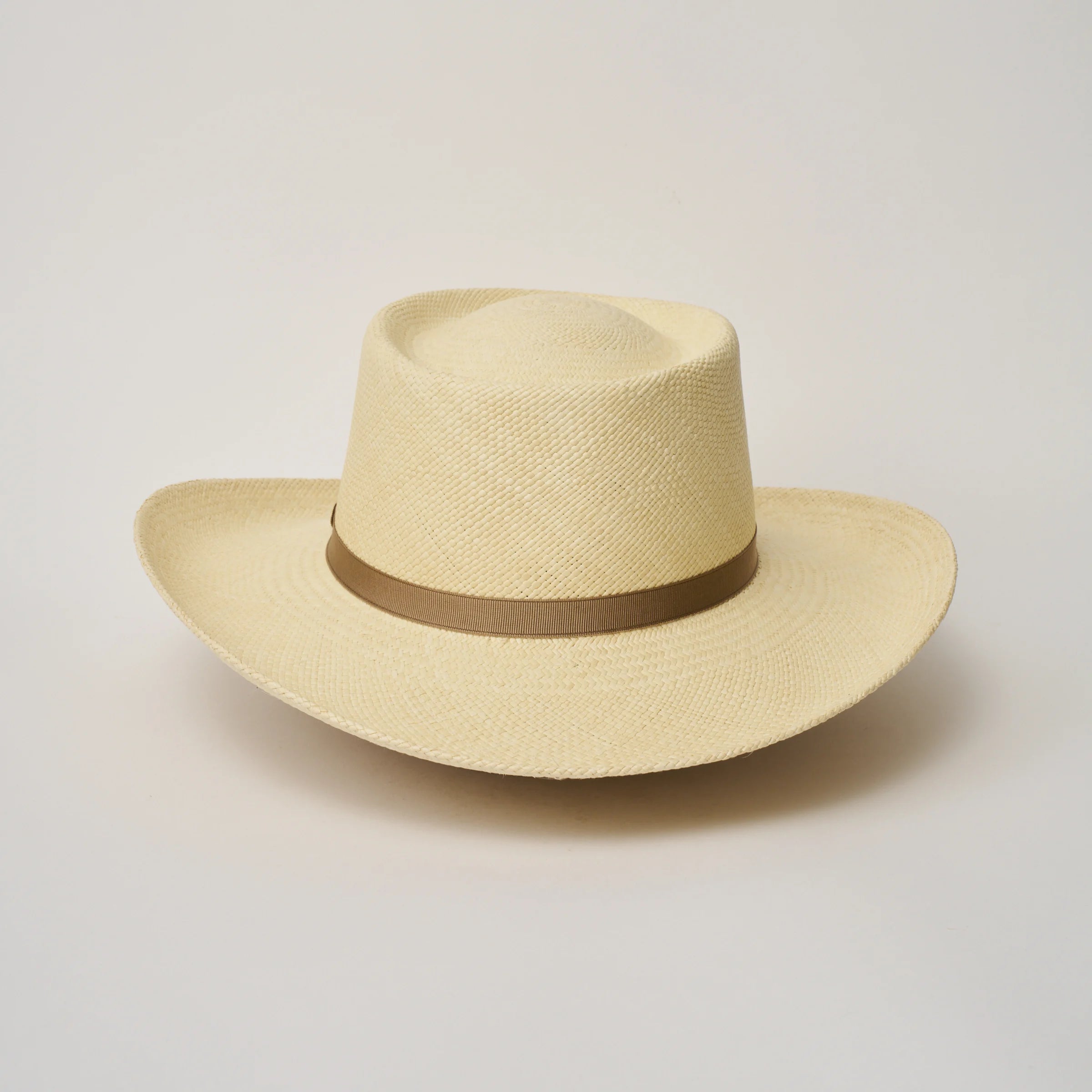 Studio image of the Camilo Gambler Natural coloured Panama Hat with Taupe trim taken from the back.