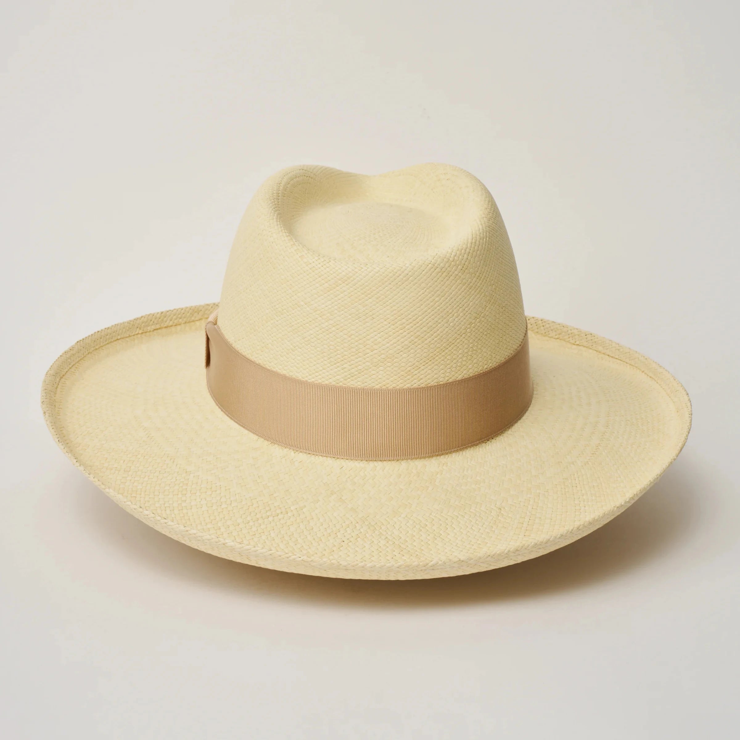 Studio image of the Camilo Grand Planter Natural coloured Panama Hat with Bone trim taken from the back.