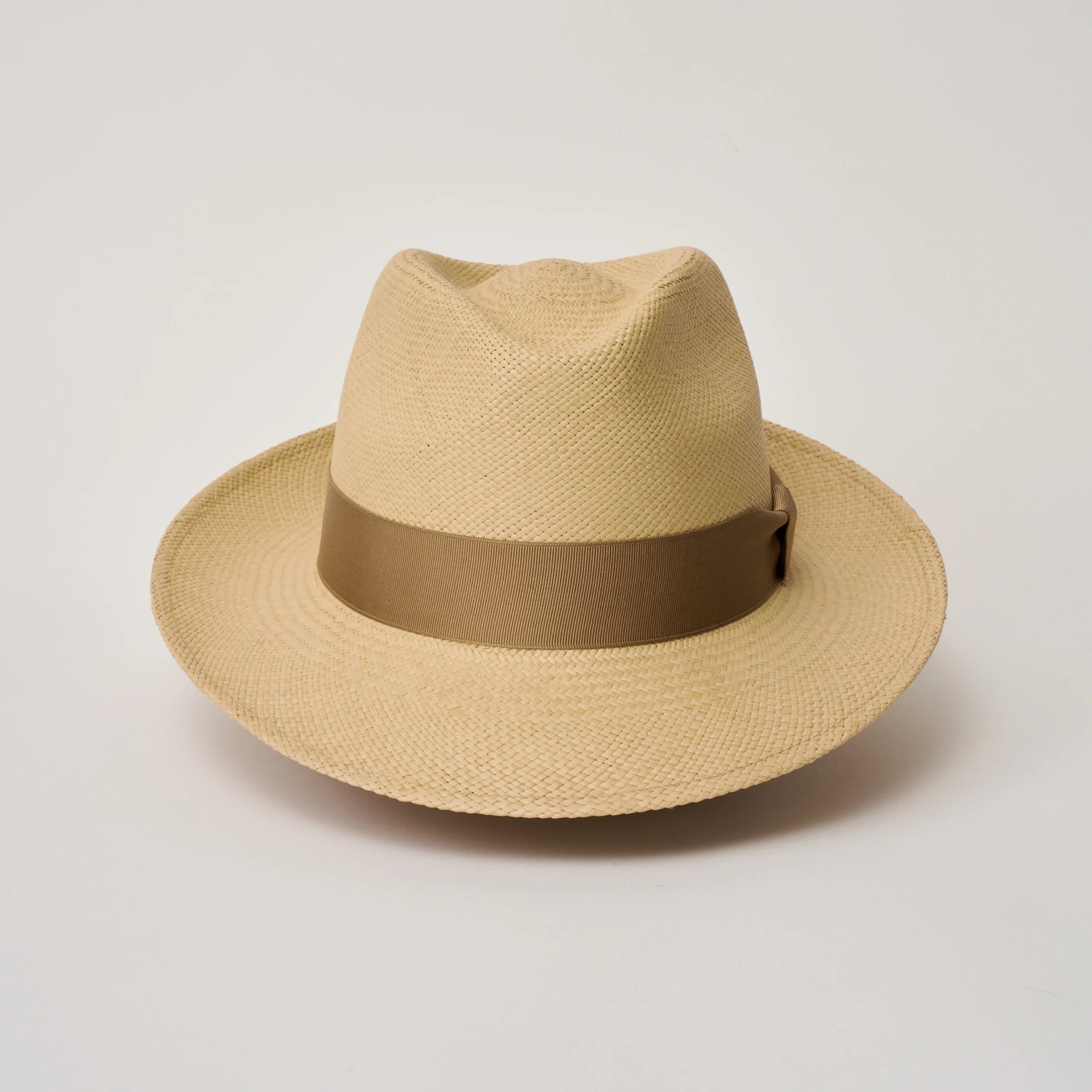 Studio image taken from the front, showing the Camilo New Fedora Sand coloured Panama Hat with Tan trim.