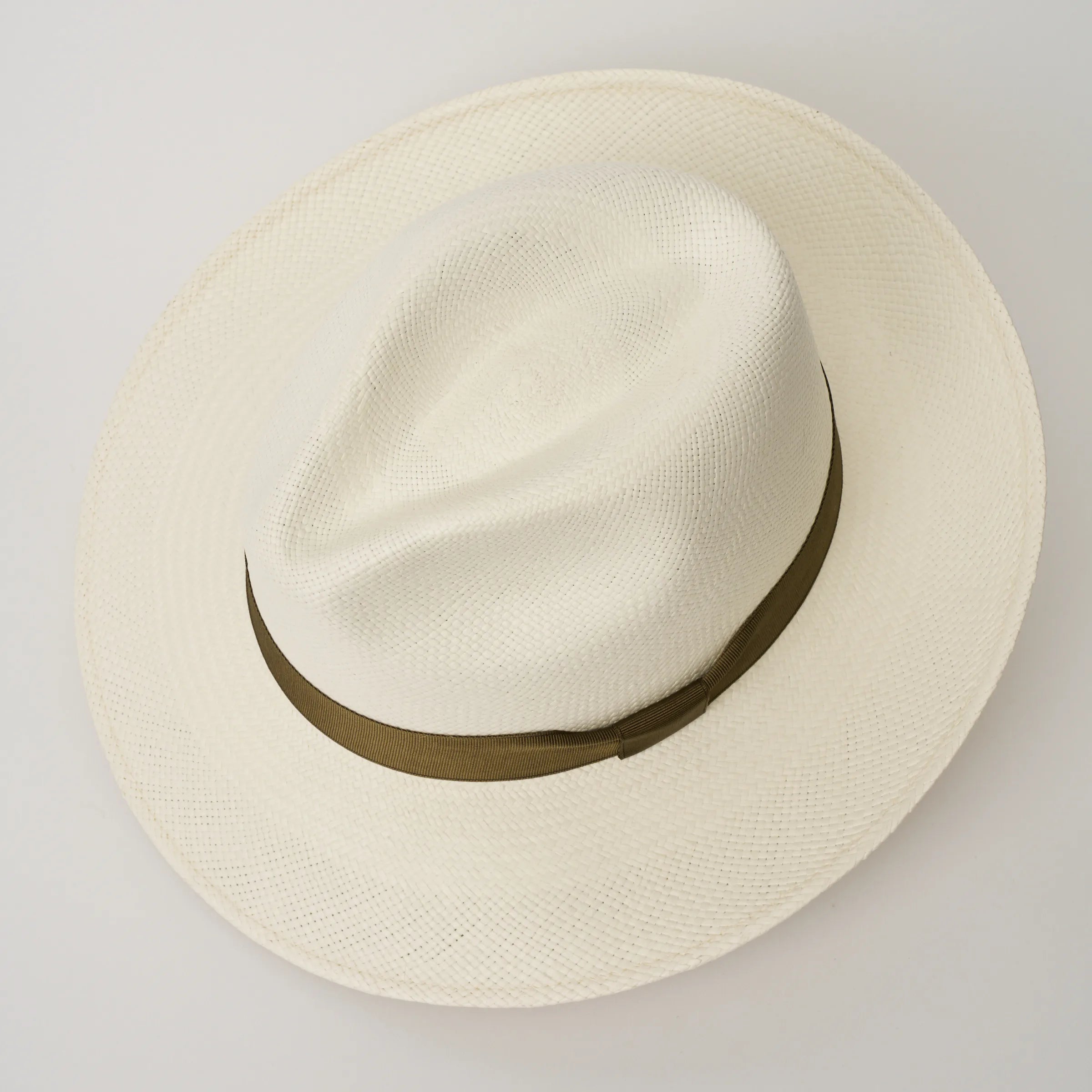 Studio image looking top-down, of the Camilo Classic Cream coloured Panama Hat with Fawn trim, showing the crown shape and weave details.