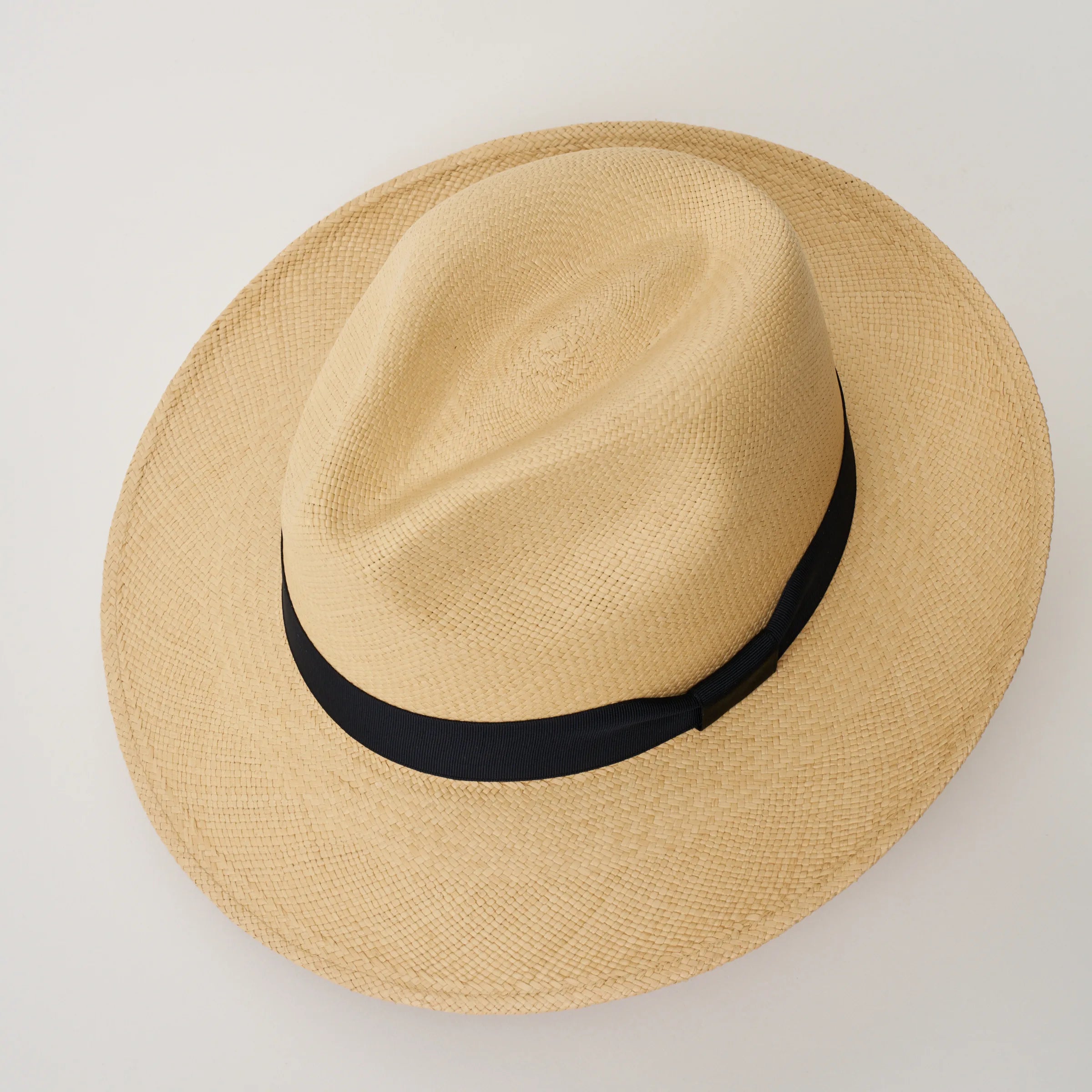 Studio image looking top-down at the Camilo Classic Sand coloured Panama Hat with Marine trim, showing the crown shape.