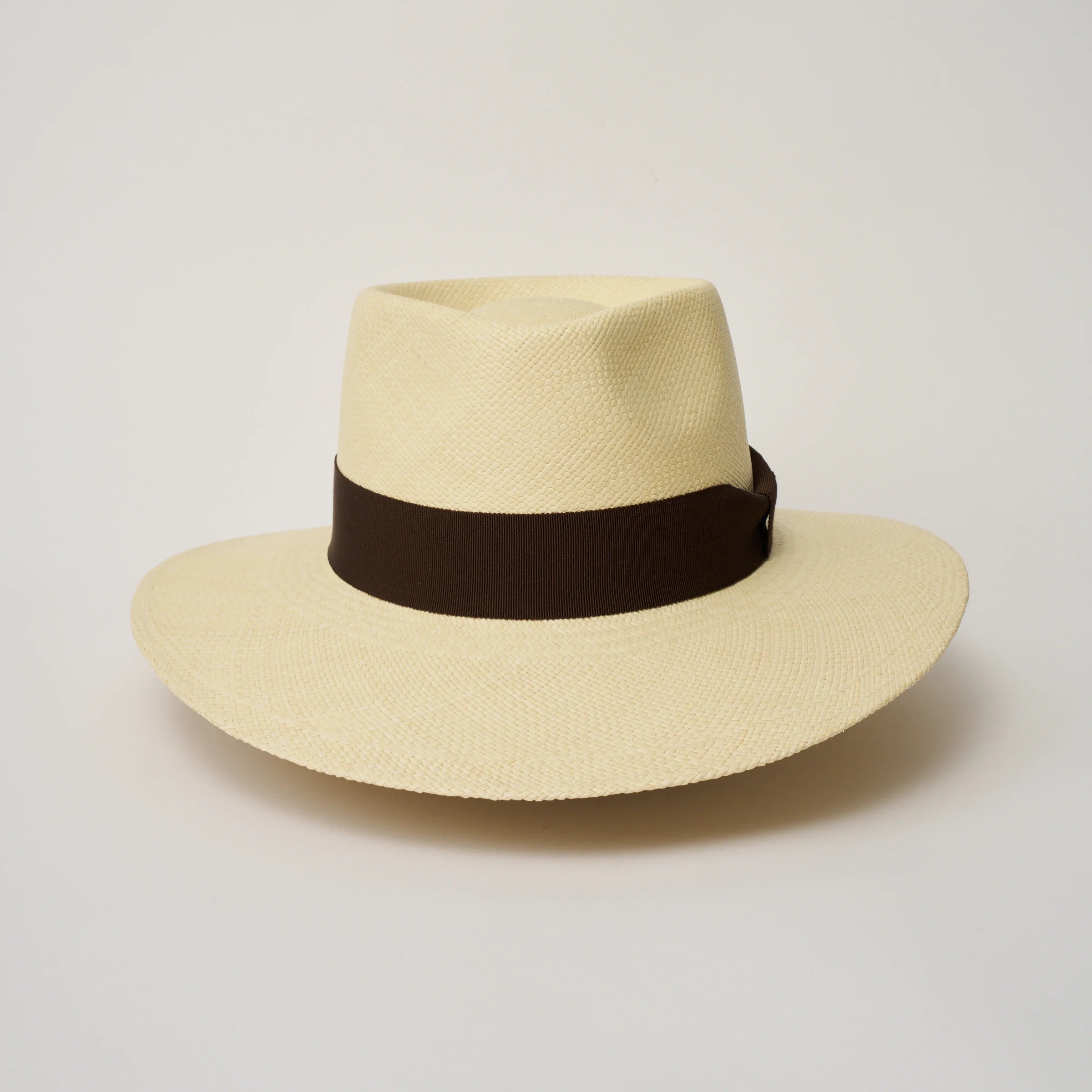 Studio image of the Camilo Country Natural coloured Panama Hat with Chocolate trim taken from the front, showing pinch.
