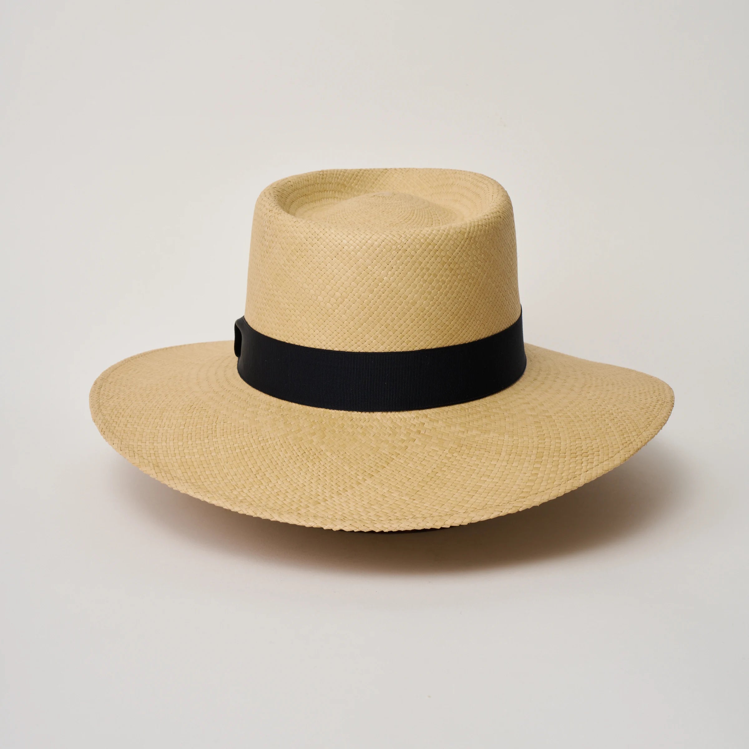 Studio image of the Camilo Country Sand coloured Panama Hat with Marine trim taken from the back.