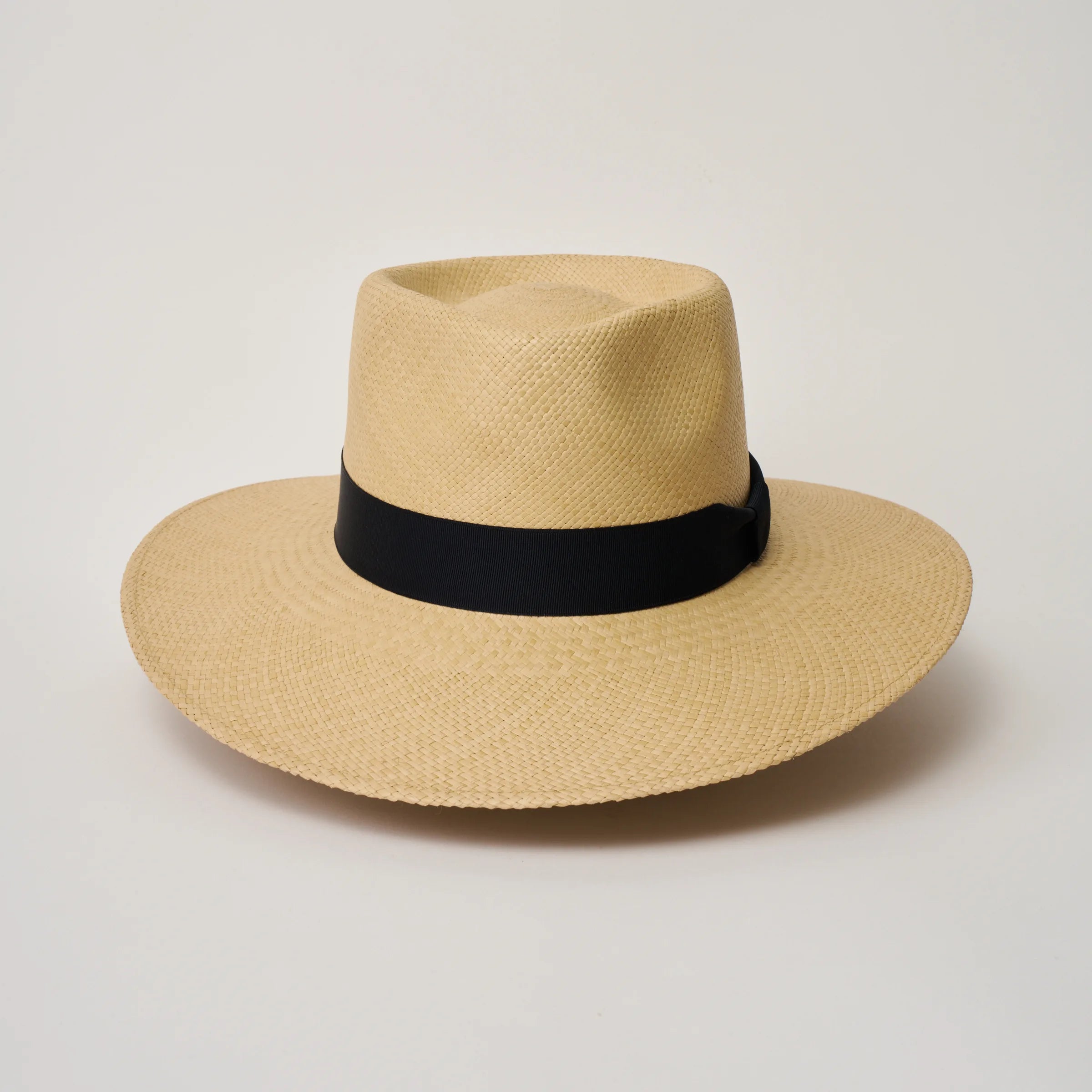 Studio image of the Camilo Country Sand coloured Panama Hat with Marine trim taken from the front, showing pinch.