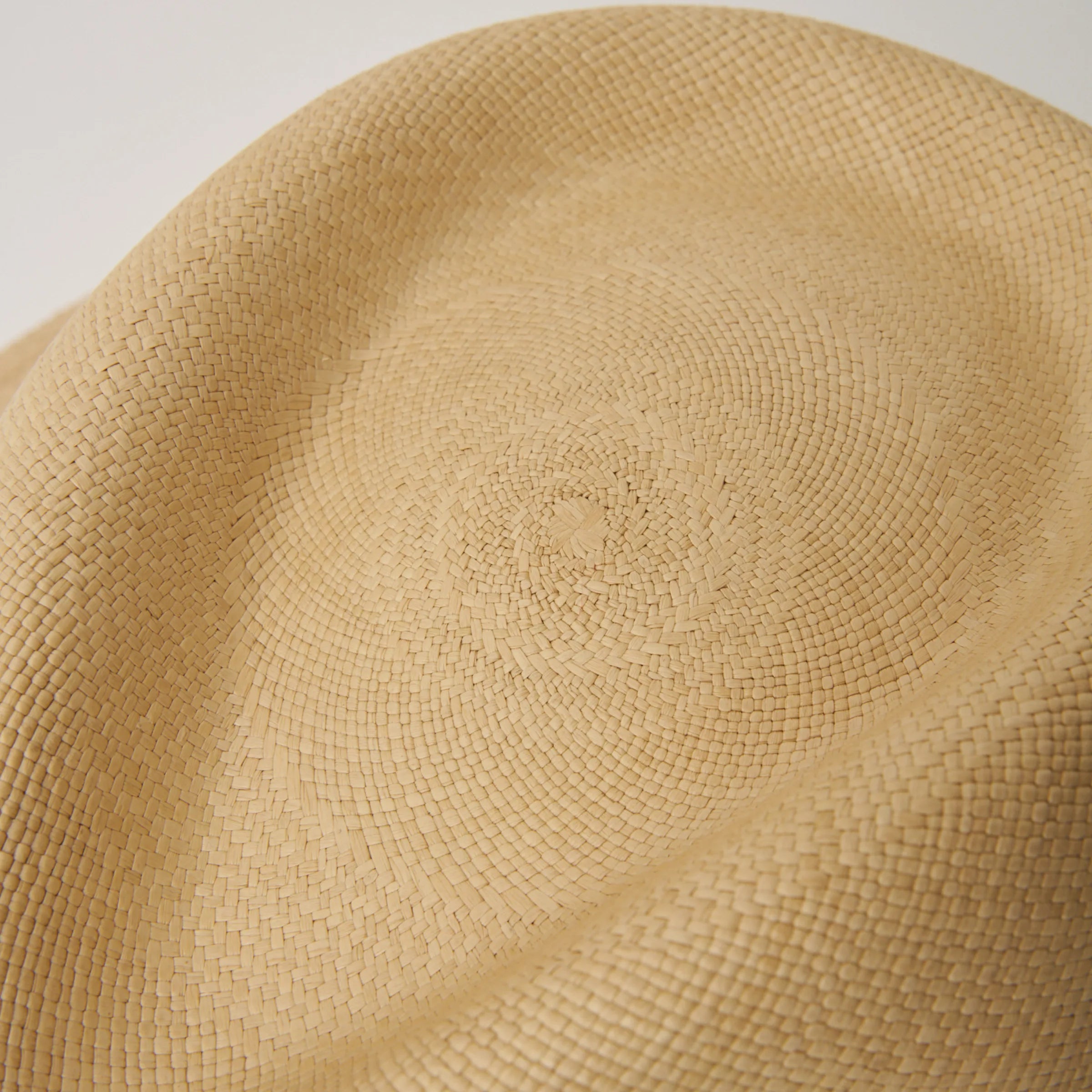 Studio closeup image of the top of the crown on the Sand coloured Camilo Executive Fino Panama hat.