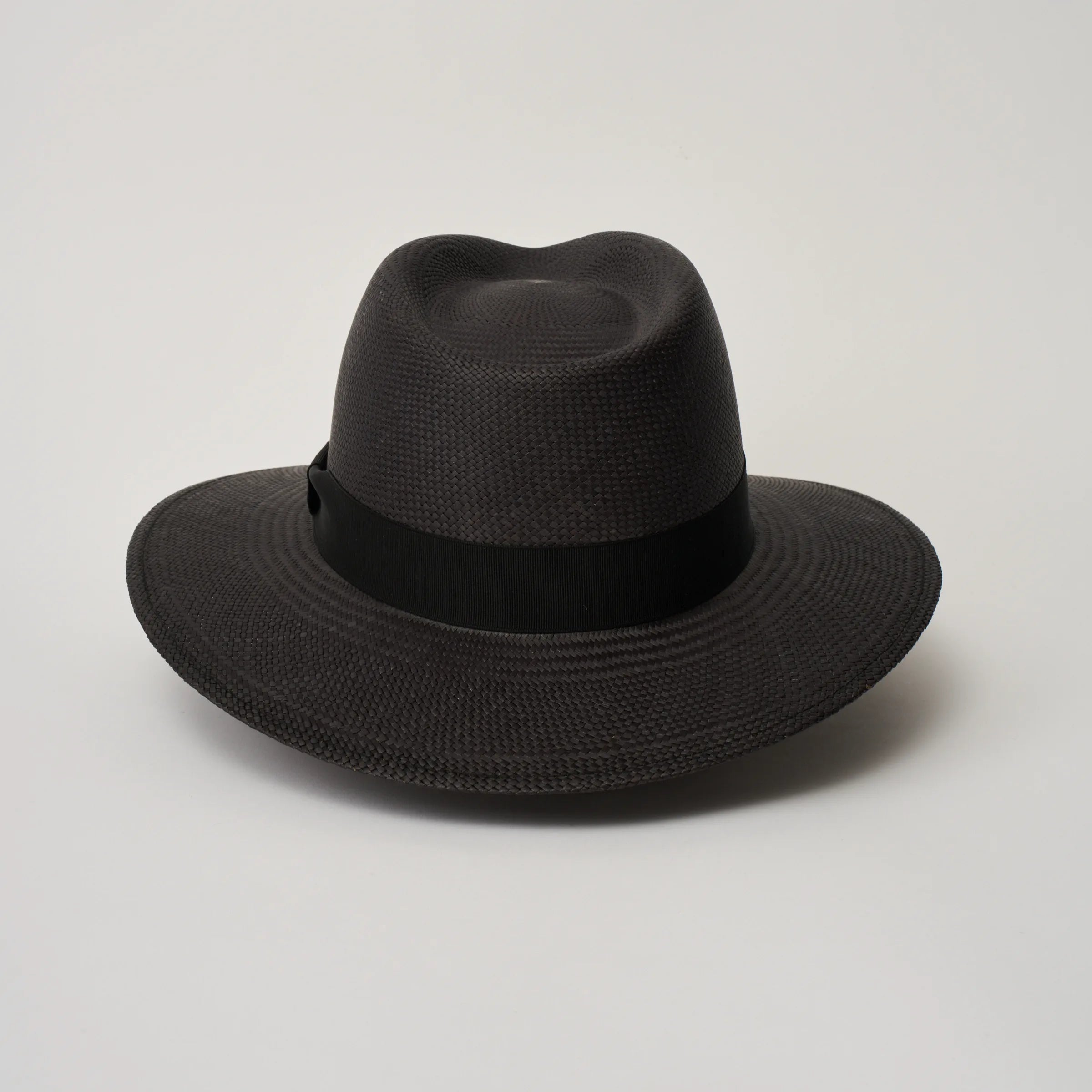 Studio image of the Camilo Executive Black coloured Panama Hat with Black trim taken from the back.