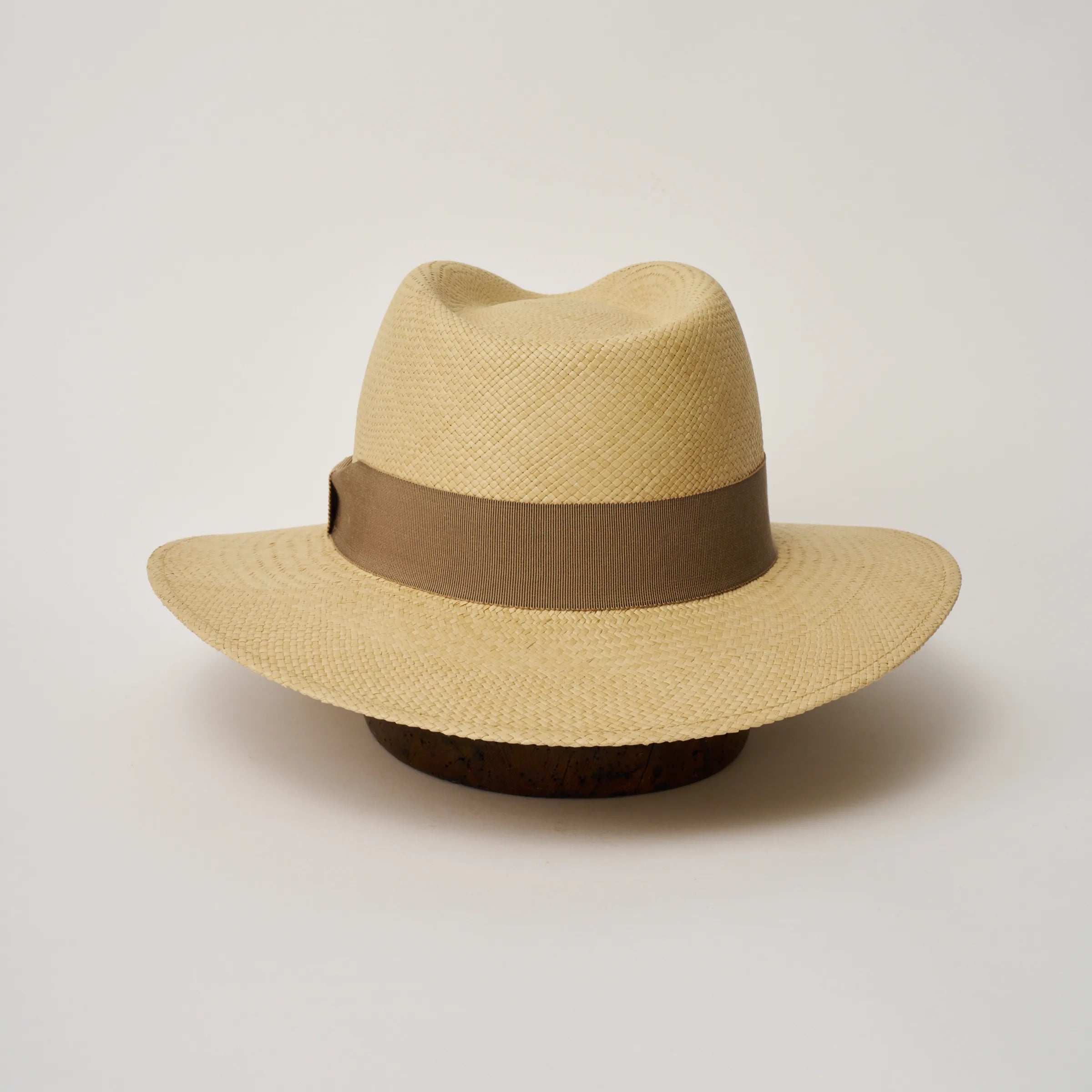 Studio image of the Camilo Executive Sand coloured Panama Hat with Oat trim taken from the back.