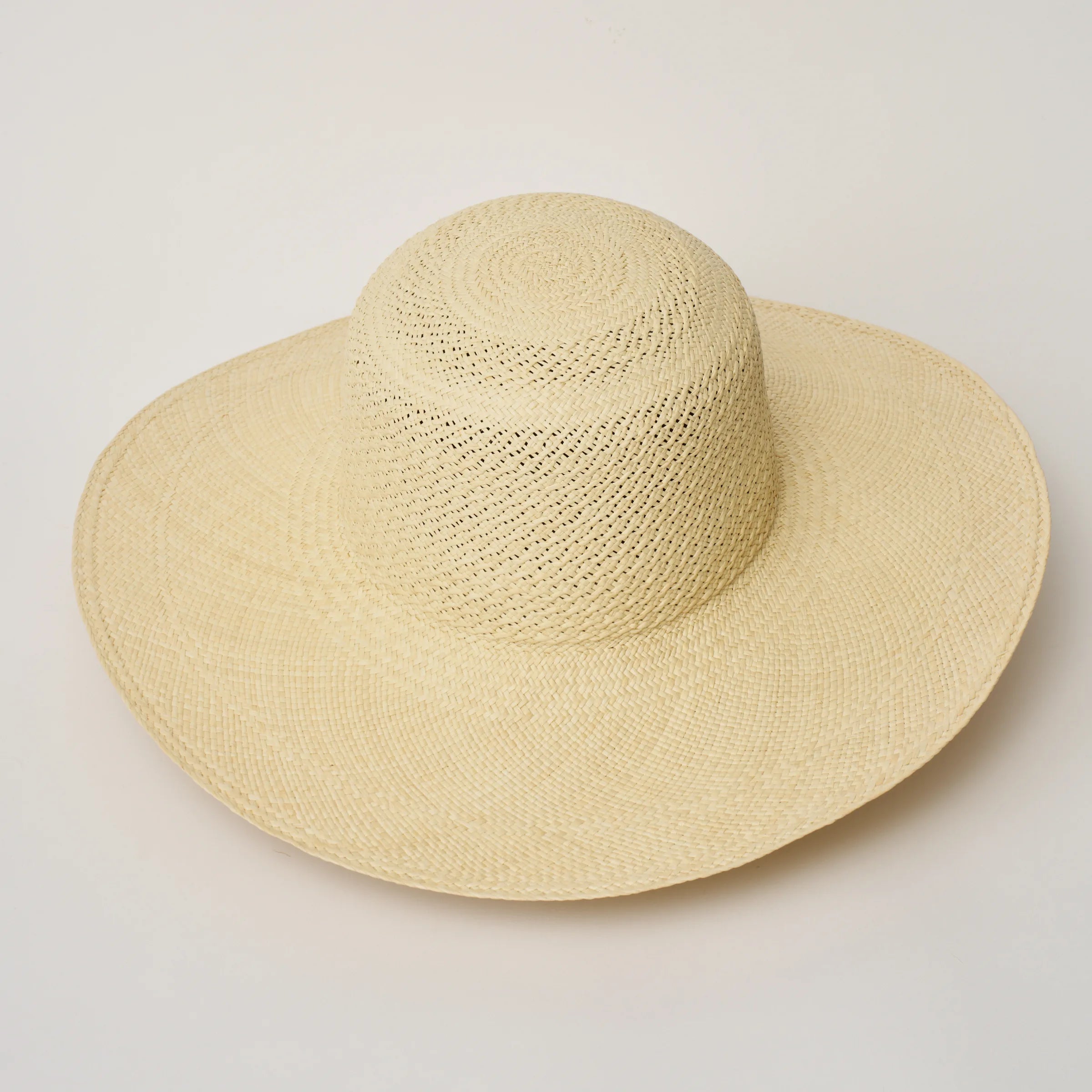 Studio image, angle view of the Rio Natural coloured Panama Hat, showing the crochet detail on the open crown and brim size.