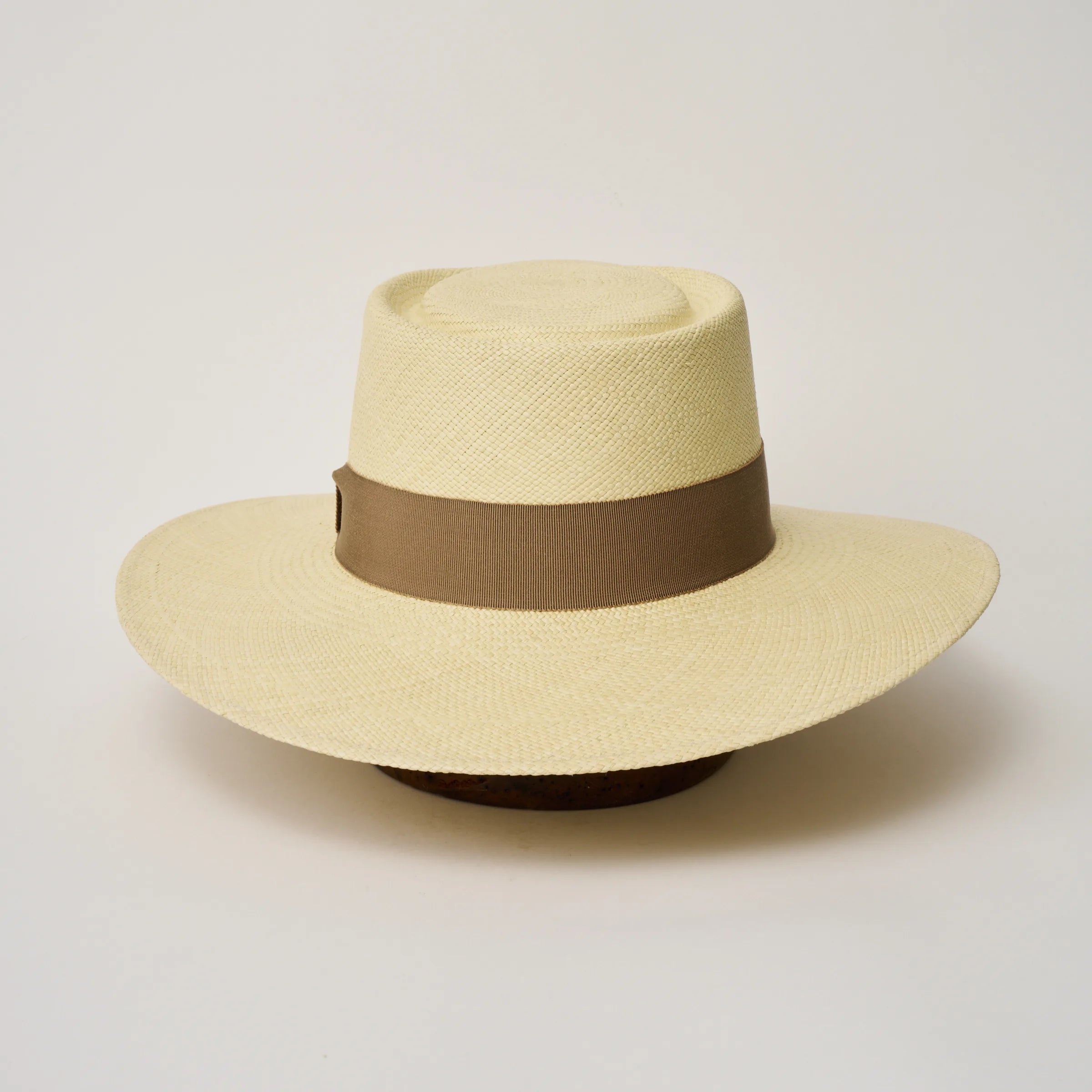 Studio image of the Camilo Sol Natural coloured Panama Hat with Oat trim taken from the back.