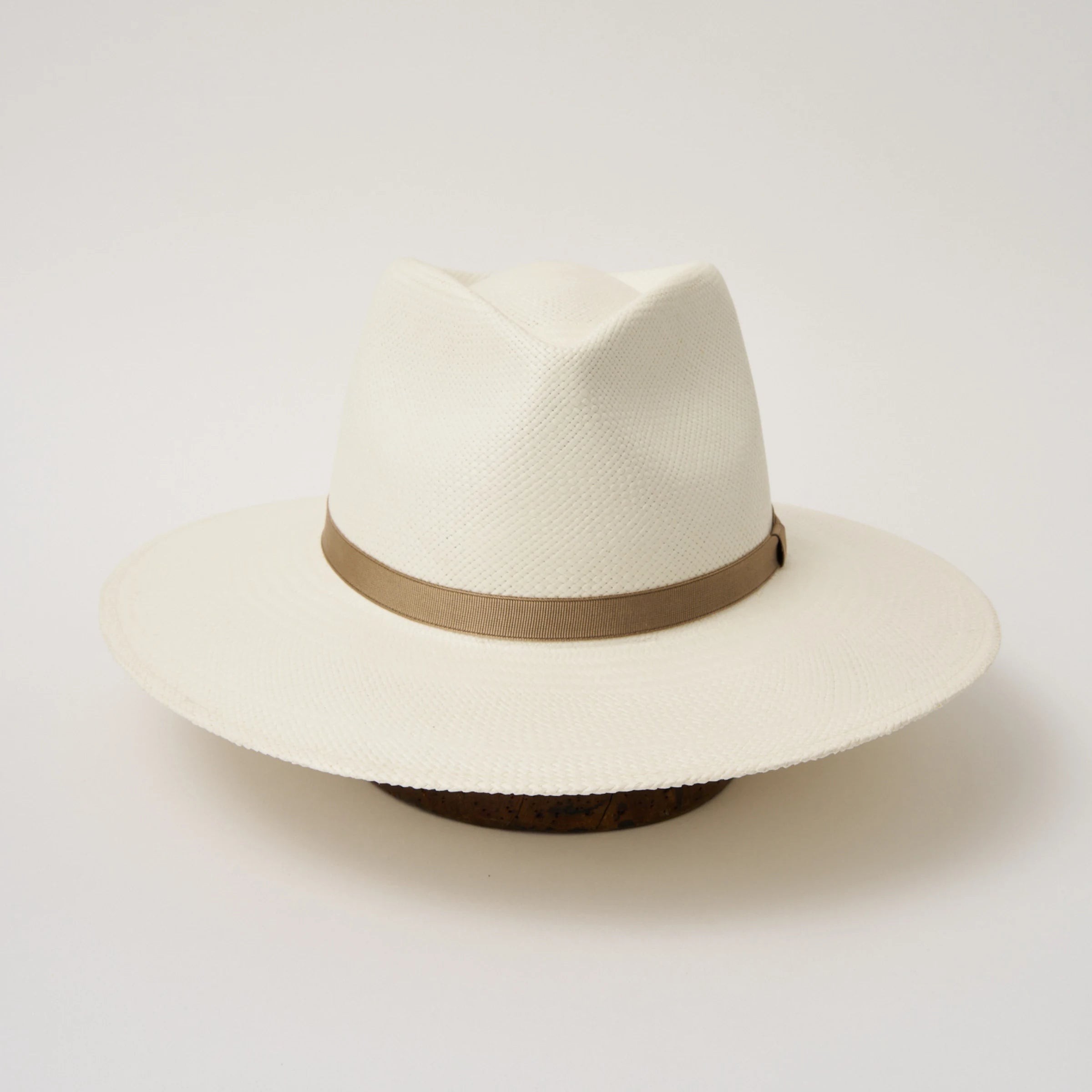 Studio image of the Camilo Vita Cream coloured Panama Hat with Taupe trim taken from the front showing pinch and brim.