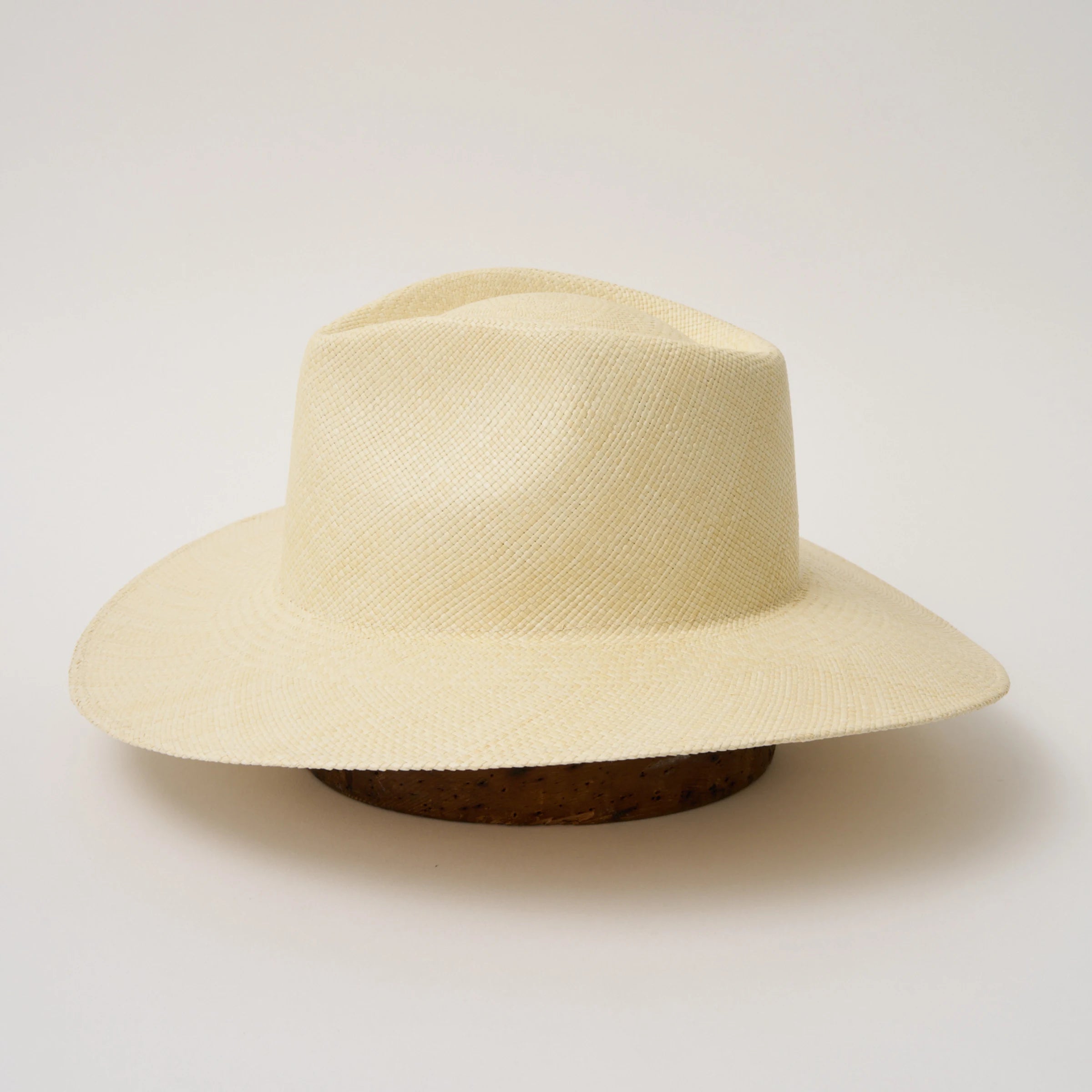 Studio image of the Camilo Vita Natural coloured Panama Hat taken from the side.