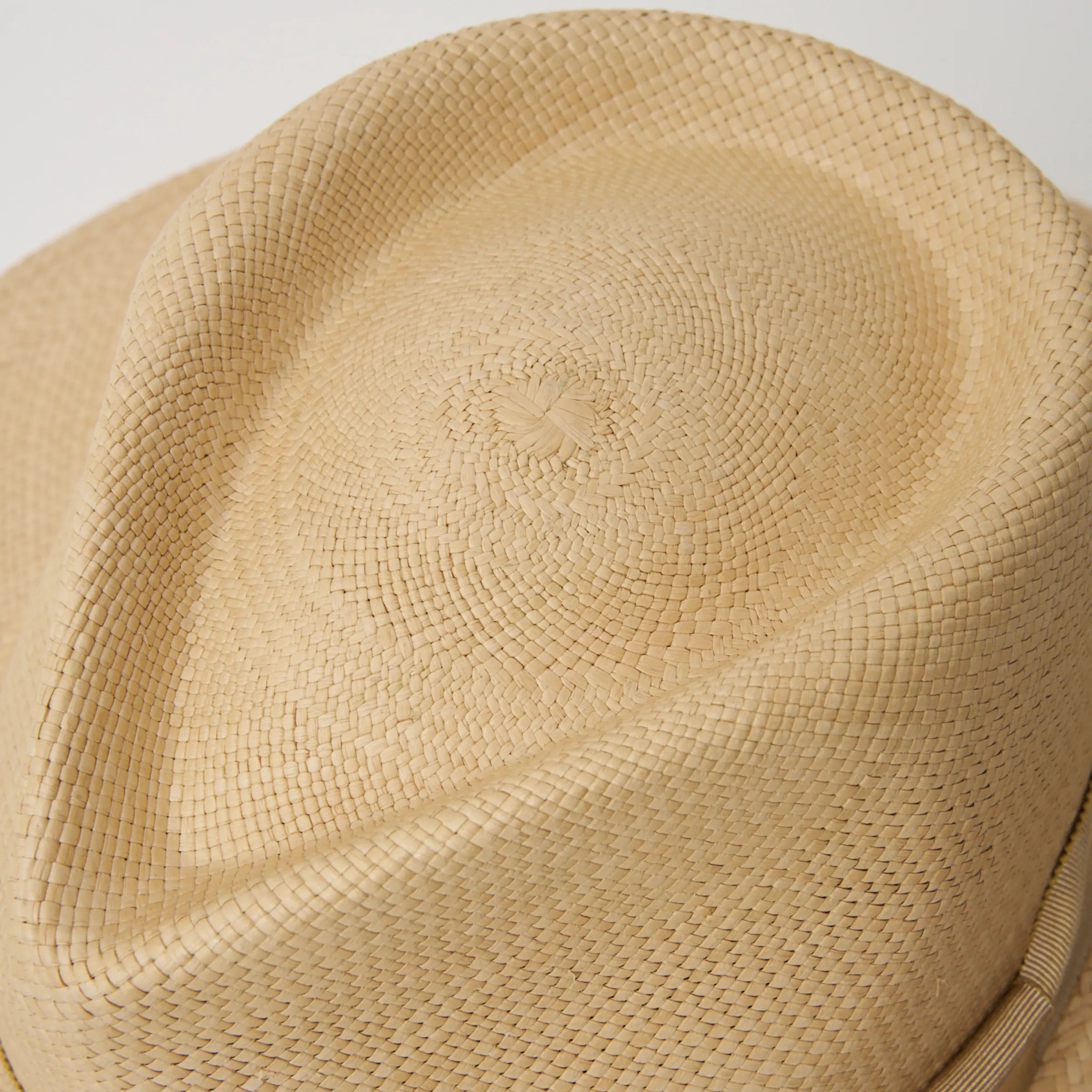 Studio closeup image of the top of the crown on the Sand/Camel coloured Camilo Vita Panama hat.