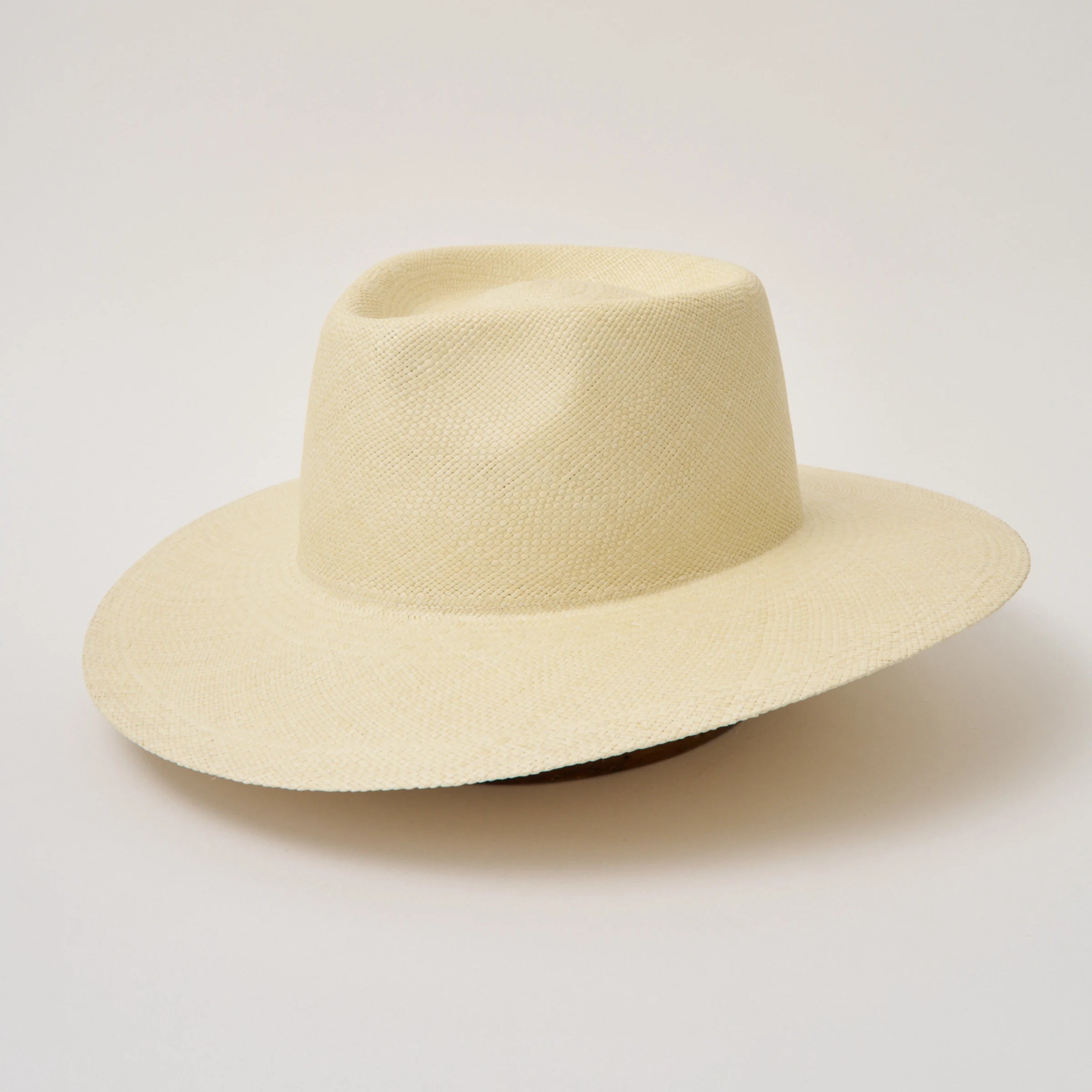 Studio image, angled view of the Camilo Country Natural coloured Panama Hat, showing the overall hat shape.