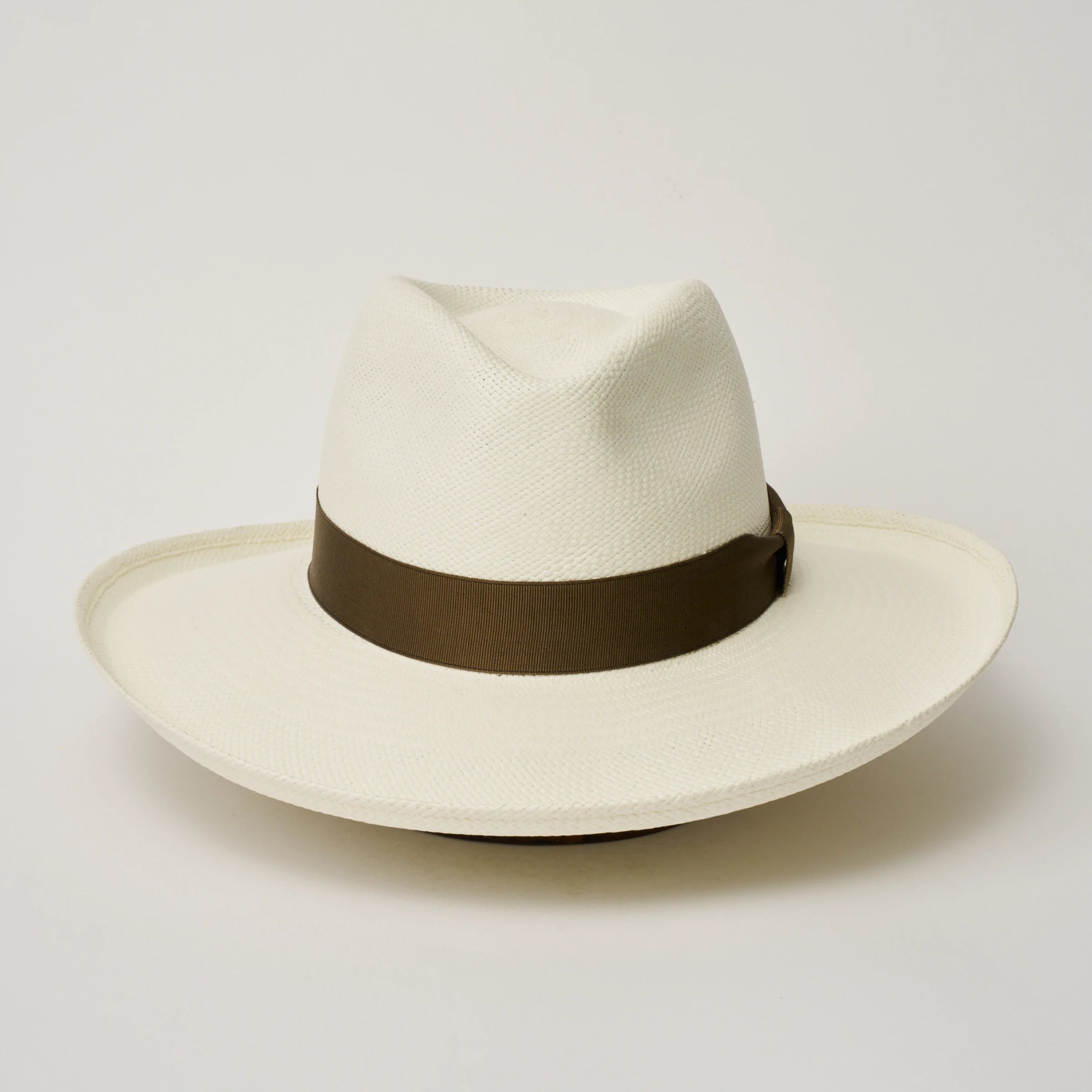 Studio image, looking top-down on the Camilo Grand Planter Cream coloured Panama Hat with Fawn trim, showing the crown and brim shape.